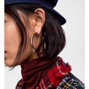 Gold metal hoop earrings